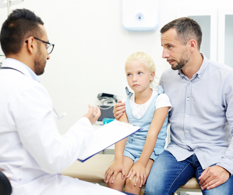 Male Doctor attending to another child