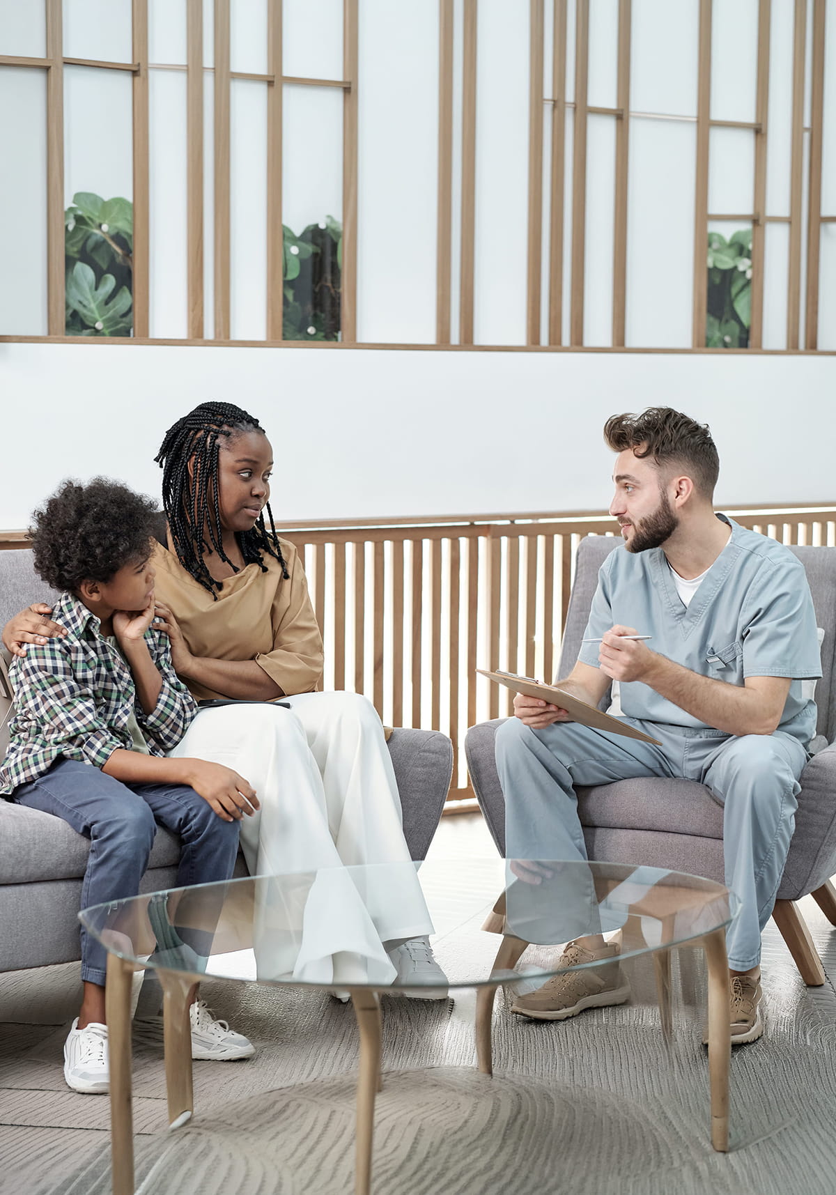 confident doctor uniform consulting african female with her son 1 1
